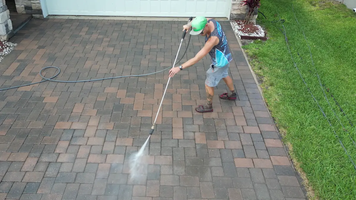 Pressure washing a driveway