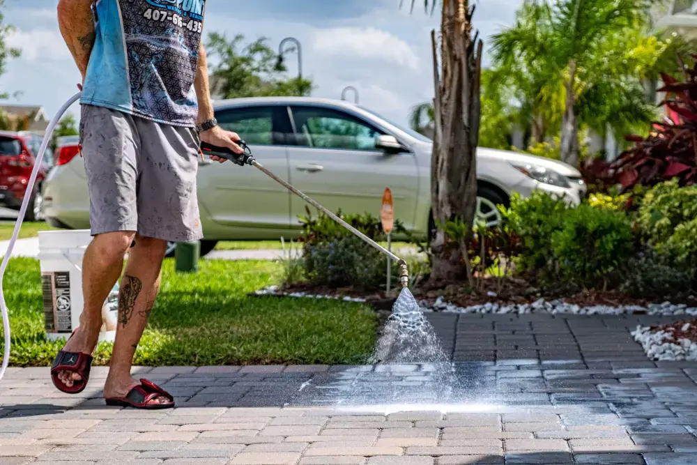 Pressure washing a walkway